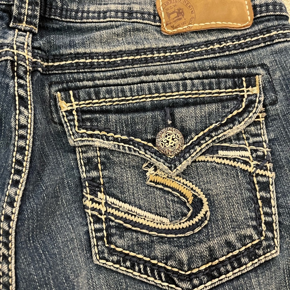 Silver Suki jeans.